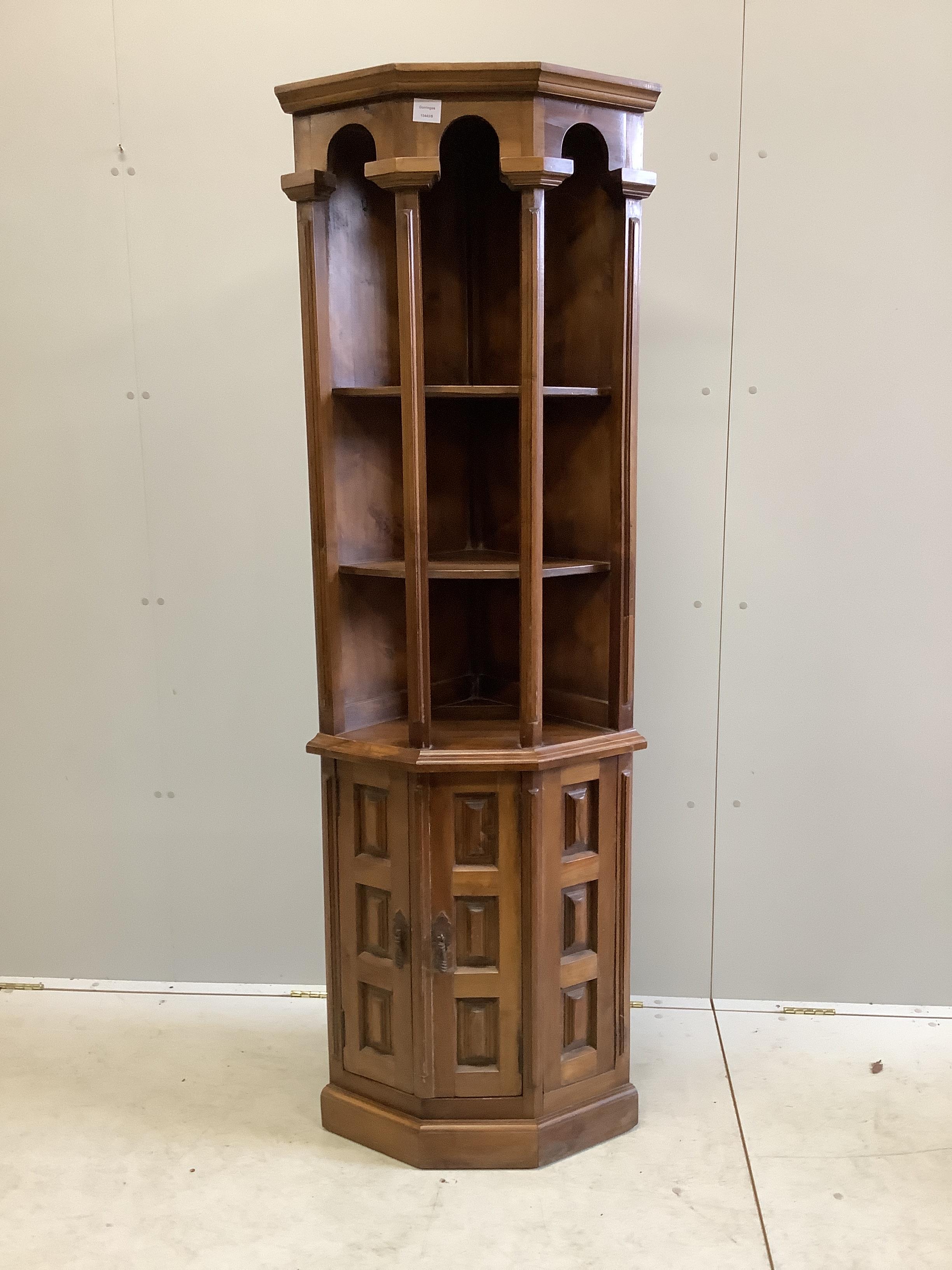 A Spanish walnut corner cupboard, width 59cm, depth 40cm, height 179cm
